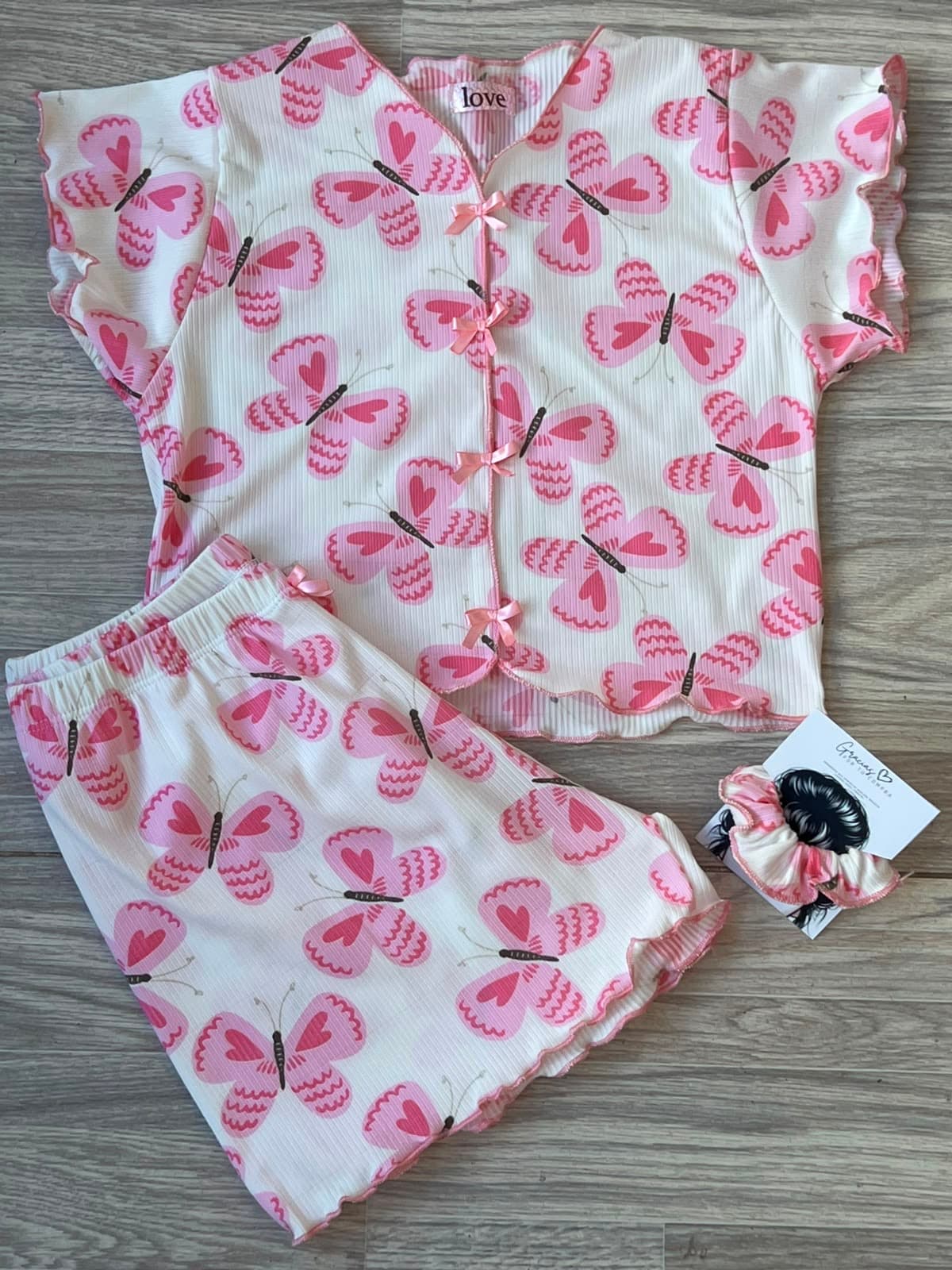 SHORT MANGA MARIPOSAS ROSADAS