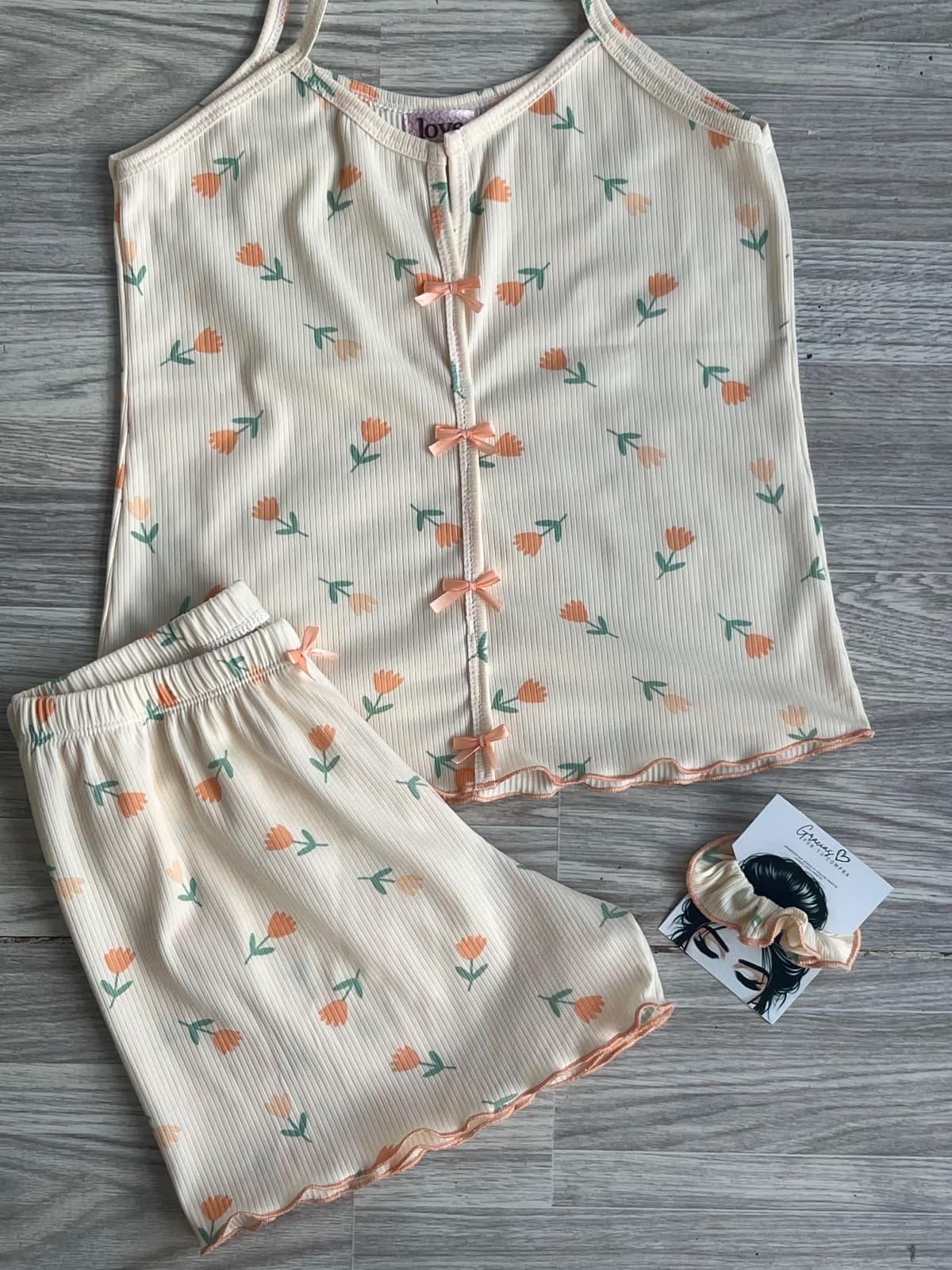 SHORT TIRA LARGA FLORES NARANJAS