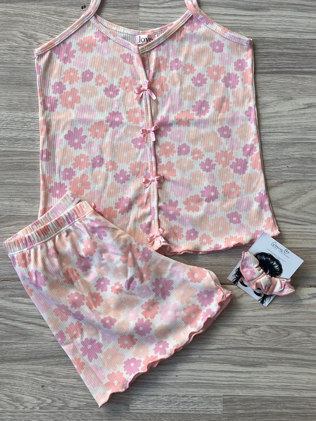 SHORT TIRA LARGA FLORES ROSADAS